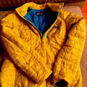 Bright yellow Patagonia quarter zip nano puff